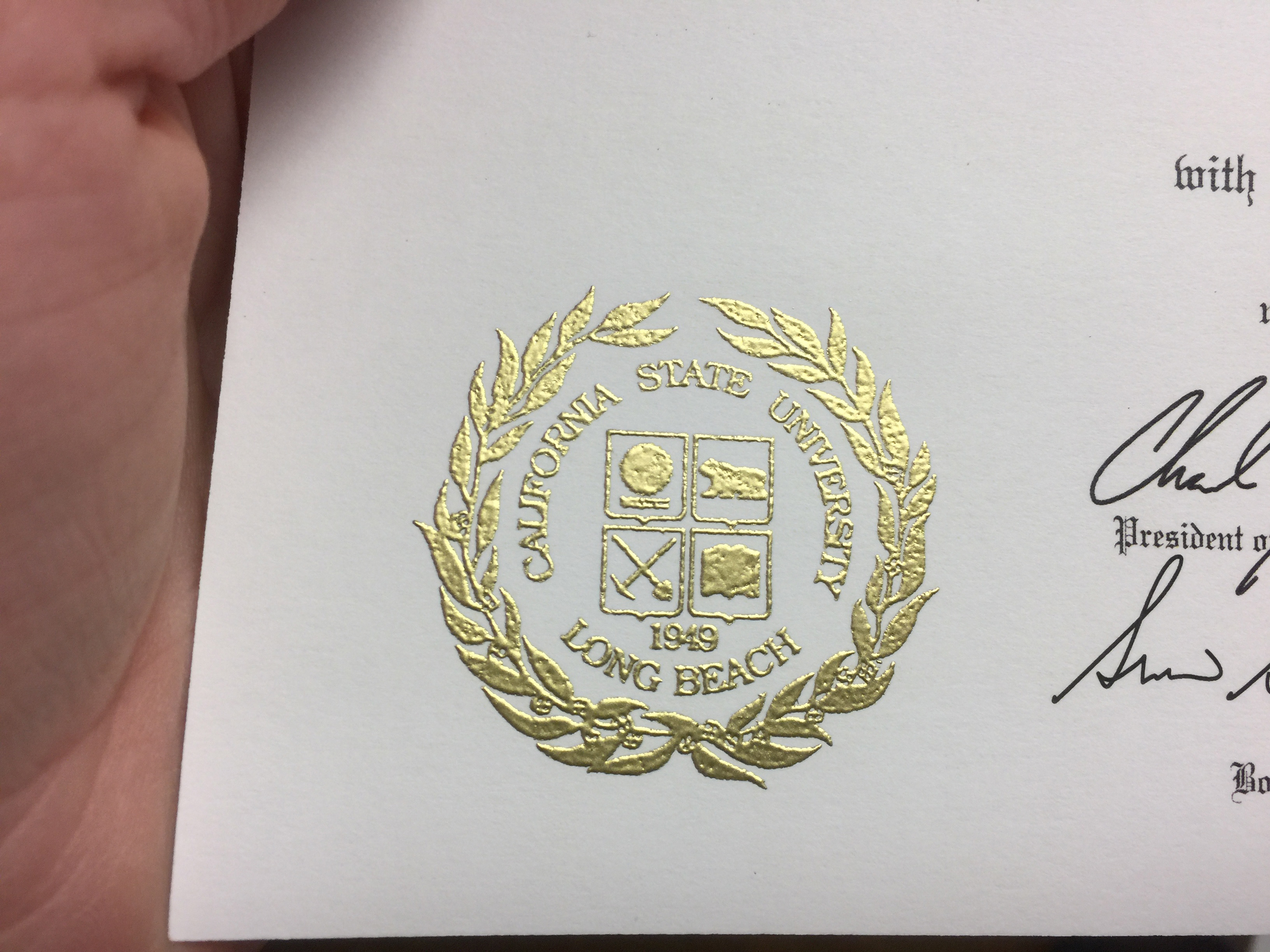Raised gold seal detail